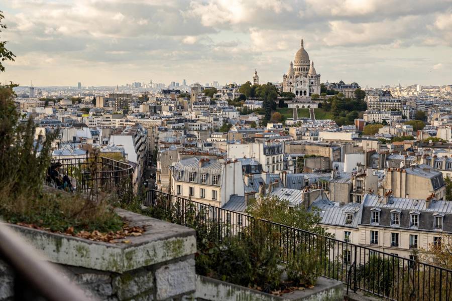 Montmartre Sacre Coeur basilica with Paris rooftops panorama