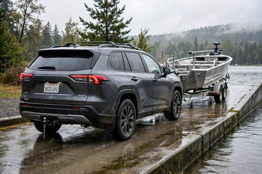 AWD SUV pulling a boat up a slippery boat ramp when towing