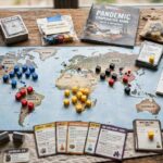 Best Cooperative Board Games for Adults A cooperative strategy board game with a world map, disease cubes, and player cards spread on a table