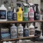 Best Detailing Chemicals for Professionals: What the Pros Use Professional detailing chemicals organized on workshop shelf