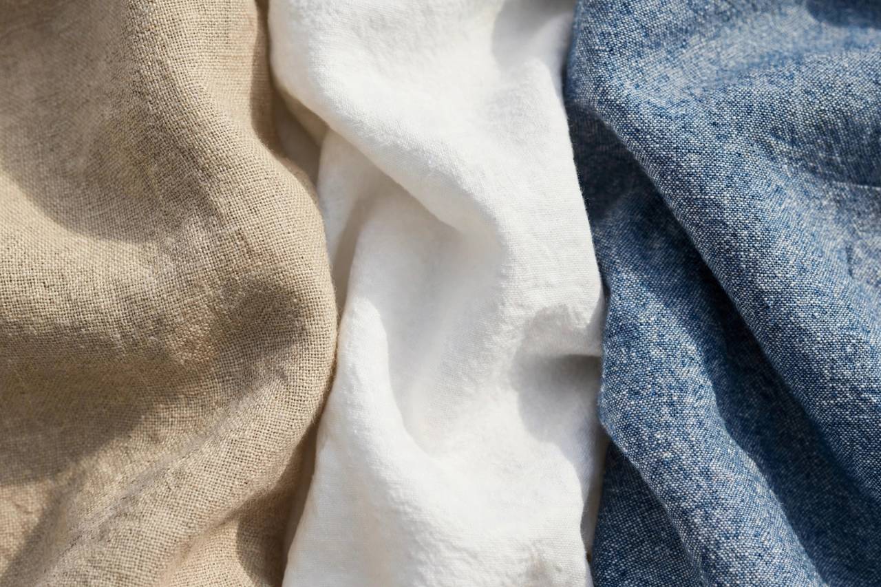 Close-up of natural summer fabric textures linen cotton and chambray