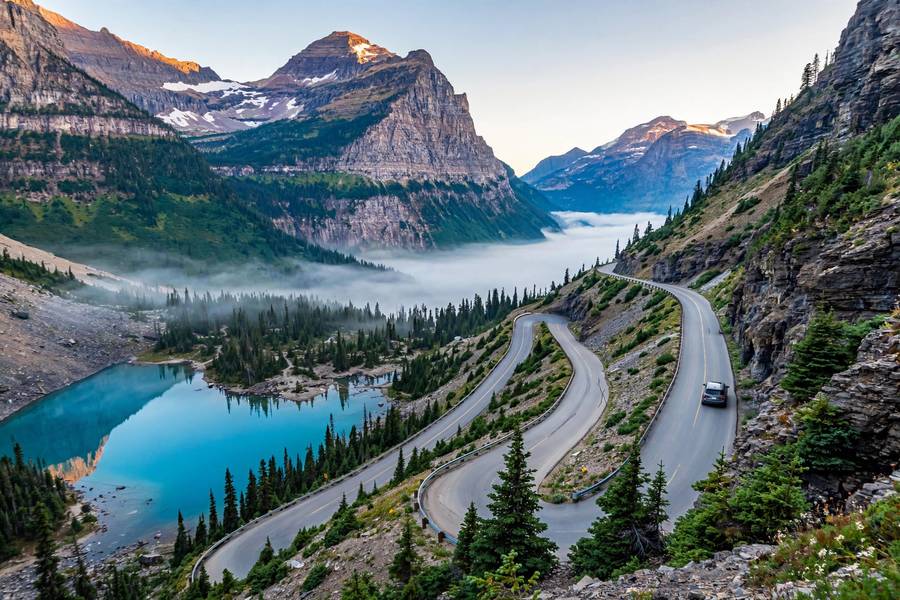 Mountain road switchbacks in Glacier National Park on a national parks road trip