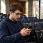 Best Note Taking App for Android: Top Picks Tested Student taking notes on an Android phone in a lecture hall