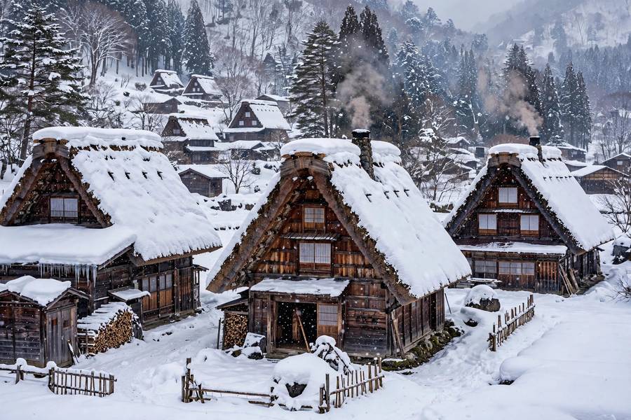 The snow-covered village of Shirakawa-go in winter, one of the most magical best places to visit in Japan