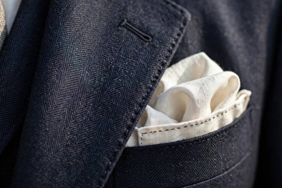 Close-up of impeccable suit tailoring details