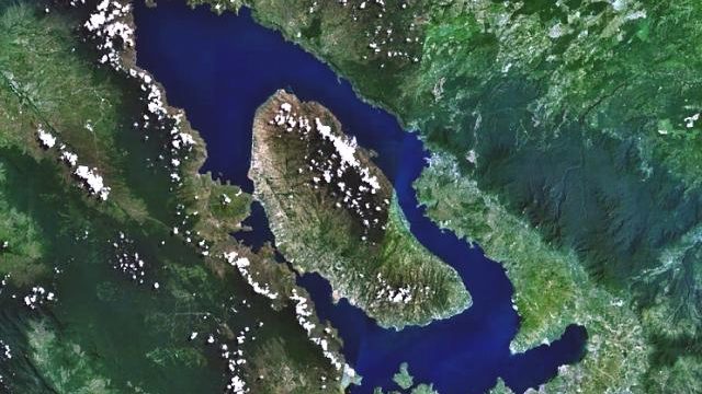 Lake Toba in Sumatra from satellite, the flooded caldera of a supervolcano that erupted about 74,000 years ago