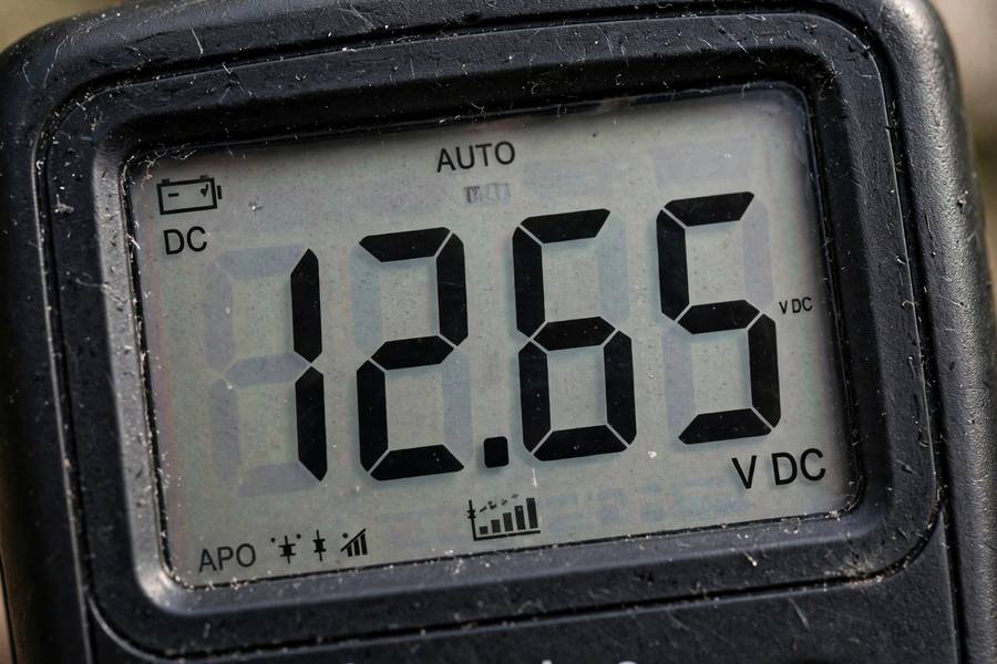 Multimeter display reading from the car battery voltage chart healthy range