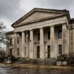 COMPAS AI Bias: The Sentencing Algorithm That Sparked a Reckoning Courthouse representing the COMPAS AI bias case in criminal sentencing