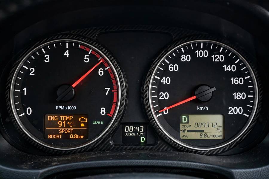 Tachometer showing high RPM with low speed, indicating transmission slipping