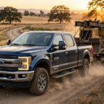 Diesel vs Petrol Torque: Why Diesels Pull Harder Down Low Diesel truck towing a heavy trailer, showing diesel vs petrol torque differences in action