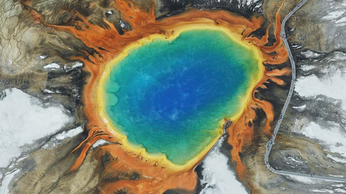 Yellowstone's Grand Prismatic Spring from above, its colours heated by the magma chamber far below
