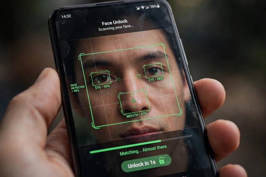 Smartphone face unlock screen showing facial recognition bias in consumer devices