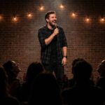 Stand-up comedian performing jokes on stage to a laughing audience