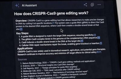 AI search answer with numbered citation links on a laptop screen