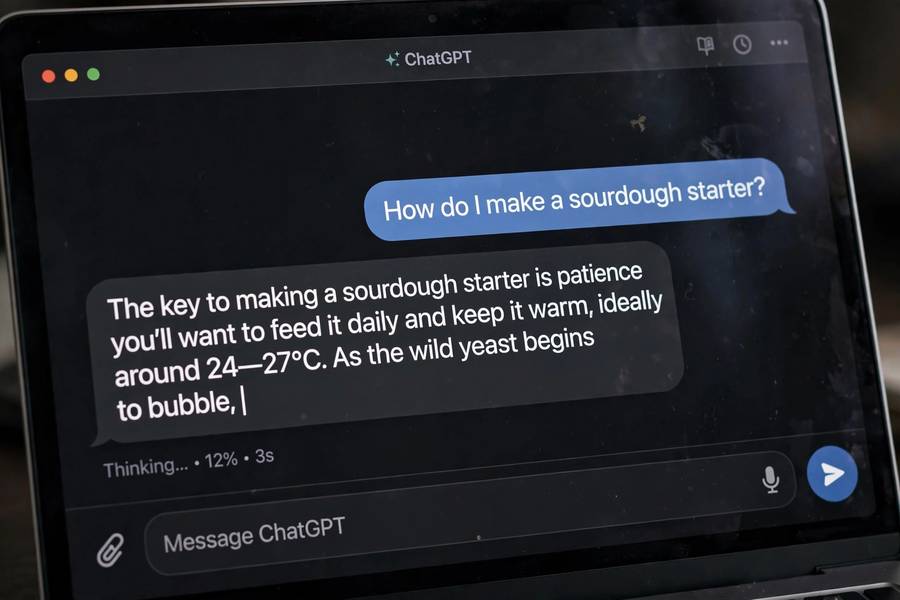 Close-up of AI text being generated word by word in a chat interface