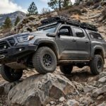 How Does Four Wheel Drive Work? The Mechanic's Breakdown 4WD truck demonstrating how four wheel drive work on rocky terrain