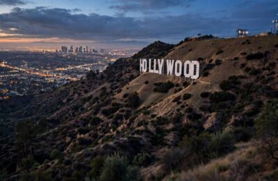 The Hollywood sign overlooking Los Angeles at dusk