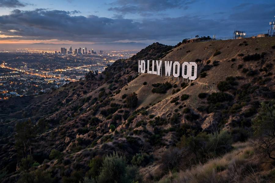 The Hollywood sign overlooking Los Angeles at dusk