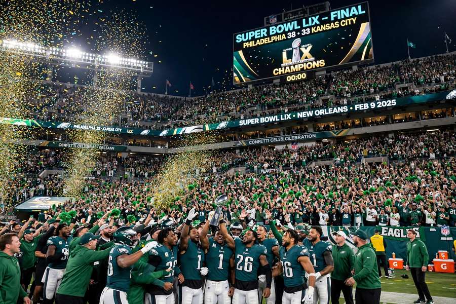 Super Bowl celebration in a packed stadium with confetti