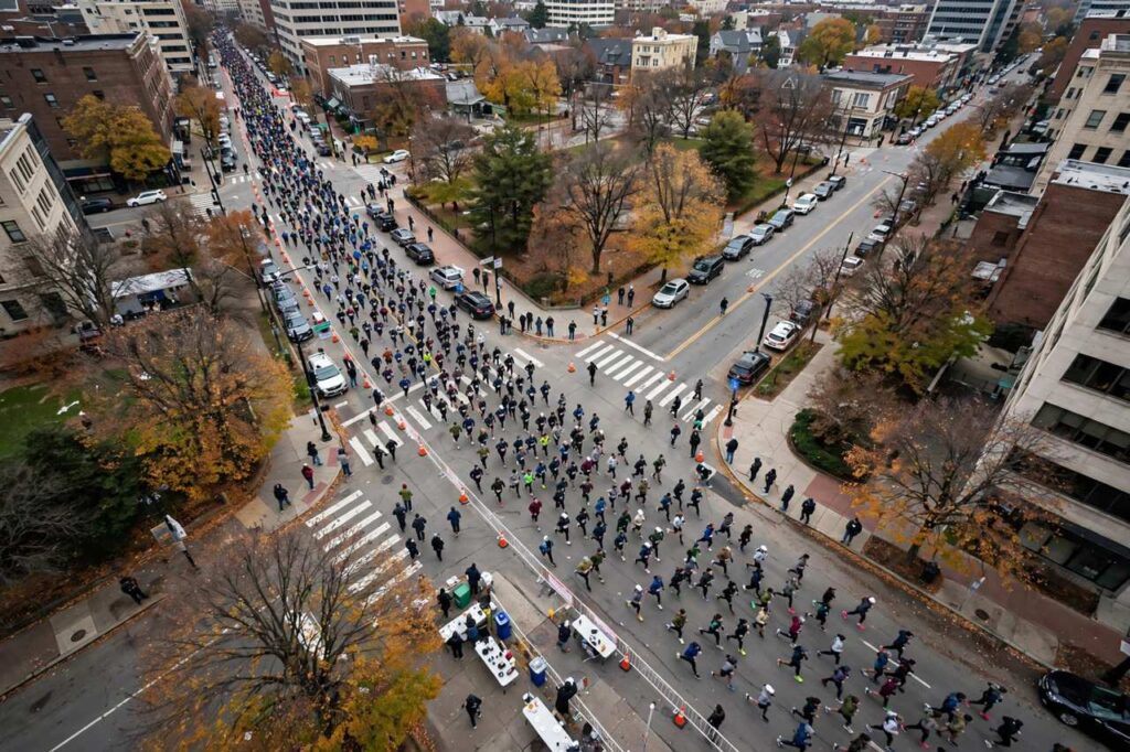 Aerial view of marathon runners on city streets