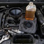 How Often to Change Engine Oil (The 3,000-Mile Myth, Busted) Car engine with oil cap open during an oil change