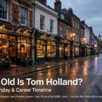How Old Is Tom Holland? Age, Birthday & Career Timeline London street scene at dusk, Tom Holland's hometown