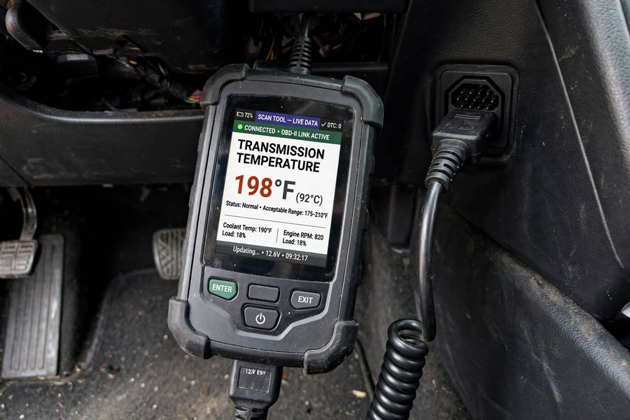 OBD-II scan tool displaying transmission fluid temperature reading