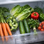 How to Keep Vegetables Fresh Longer (Stop Wasting Produce) Fresh vegetables properly stored in a refrigerator crisper drawer