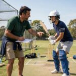 How to Play Cricket for Beginners: Skills, Gear & First Steps Beginner learning proper cricket batting stance with a coach
