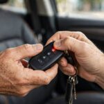 How to Program a Key Fob: DIY Steps That Actually Work Hands pressing key fob buttons during the how to program a key fob procedure