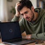 How to Speed Up a Slow Laptop: 15 Fixes That Actually Work Frustrated person looking at a slow loading laptop screen