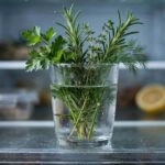 How to Store Fresh Herbs So They Last Weeks, Not Days Fresh herbs stored upright in a glass of water in the refrigerator