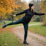 How to Stretch Before Running (The 8-Minute Warm-Up That Prevents Injury) Runner warming up with dynamic stretches outdoors