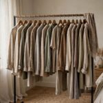 Capsule Wardrobe Guide: Fewer Clothes, Better Days A capsule wardrobe of mix-and-match garments on a single clothing rail