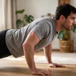 How to Do Push Ups: Proper Form Guide Man in the top position of a push-up with perfect form — how to do push ups
