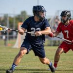 Player carrying the ball under lacrosse rules during a game