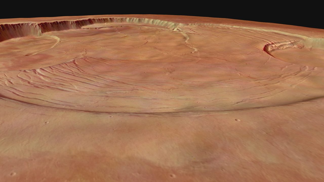 A perspective view across the wide caldera at the summit of Olympus Mons, Mars