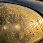 How to Clean Car Headlights: Restore Them Like New Cloudy yellowed car headlight before restoration — how to clean car headlights