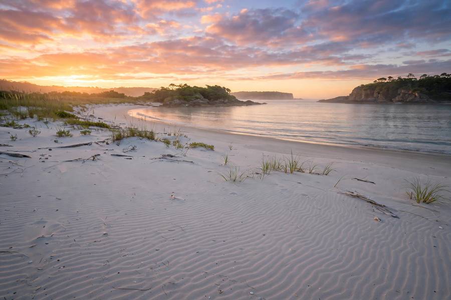 Empty beach scene showing exclusion control from the midjourney negative prompts guide