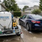 Mobile Car Wash vs Detailing Business: Which Should You Start? Mobile car wash service cleaning a sedan in a driveway