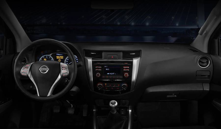 Nissan dashboard with an illuminated check engine warning light
