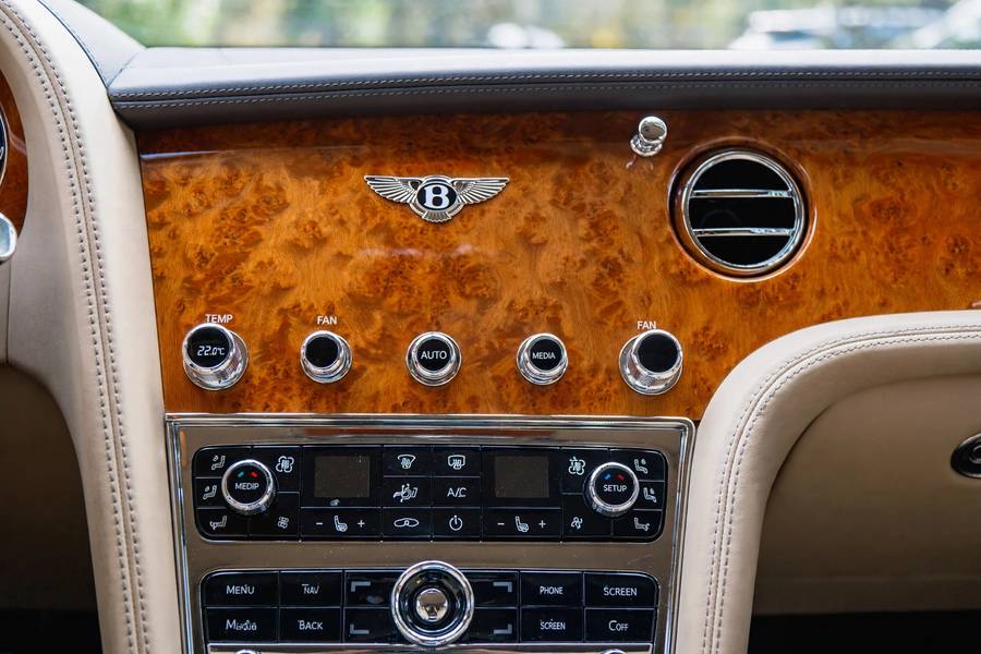 Bentley handcrafted interior details in the Rolls Royce vs Bentley luxury debate