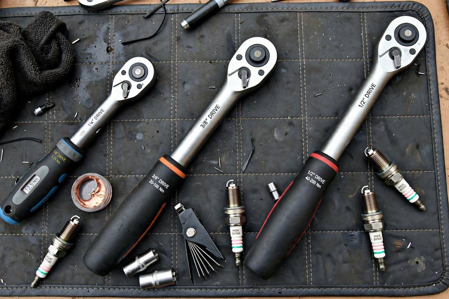 Torque wrenches used for proper spark plug tightening