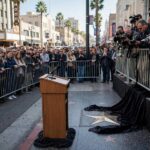 Walk of Fame Star Ceremony: How It Works Star unveiling ceremony with crowd and podium on Hollywood Boulevard