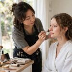 A makeup artist at work — professional wedding makeup tips start with the trial