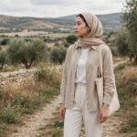 What Are Neutral Colors in Fashion? A Simple Style Guide Woman in elegant beige and white neutral-toned outfit, full-coverage modest clothing