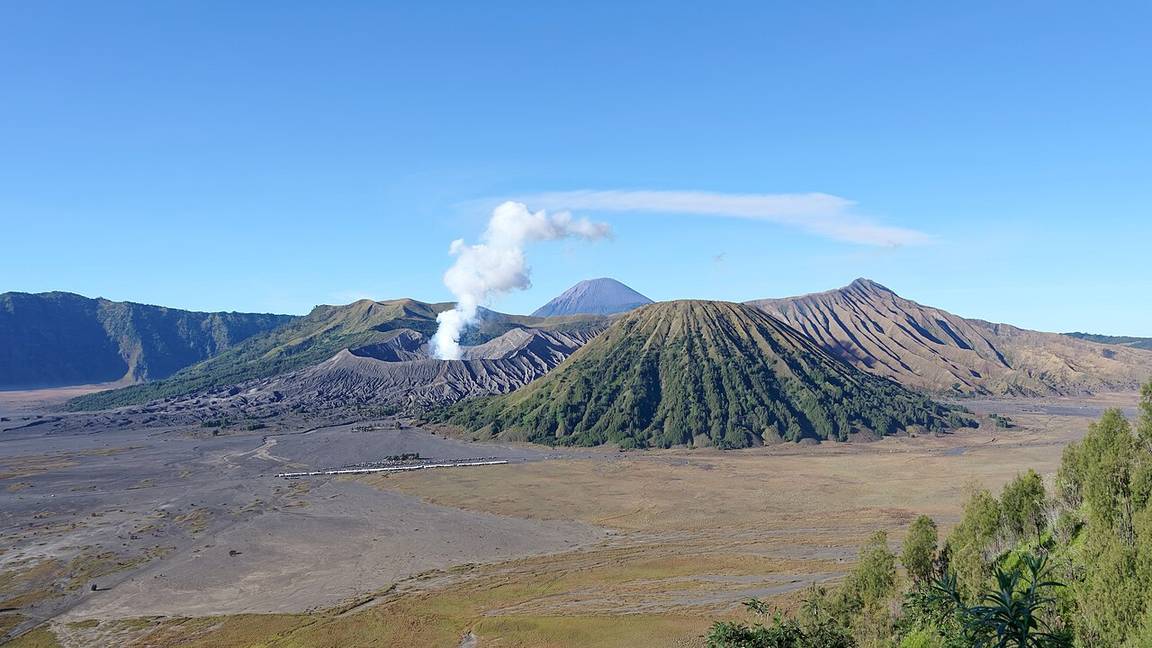 Mount Bromo smoking inside Indonesia's Tengger caldera, with newer cones growing on the caldera floor