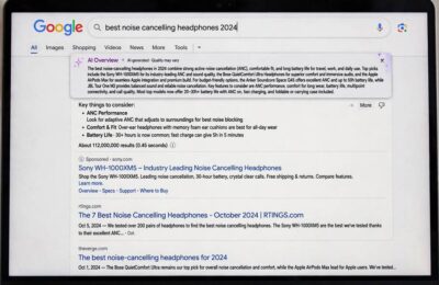 Google AI Mode overview box at the top of search results on a laptop