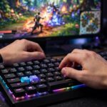 What Is RNG in Video Games? Loot Drops, Crits, and Why Players Love to Hate It Close-up of hands on a mechanical gaming keyboard with a colorful game on the monitor