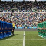 World Cup Group Stage Explained: Points, Tables, and Tactics Football group stage match with teams lining up for kickoff